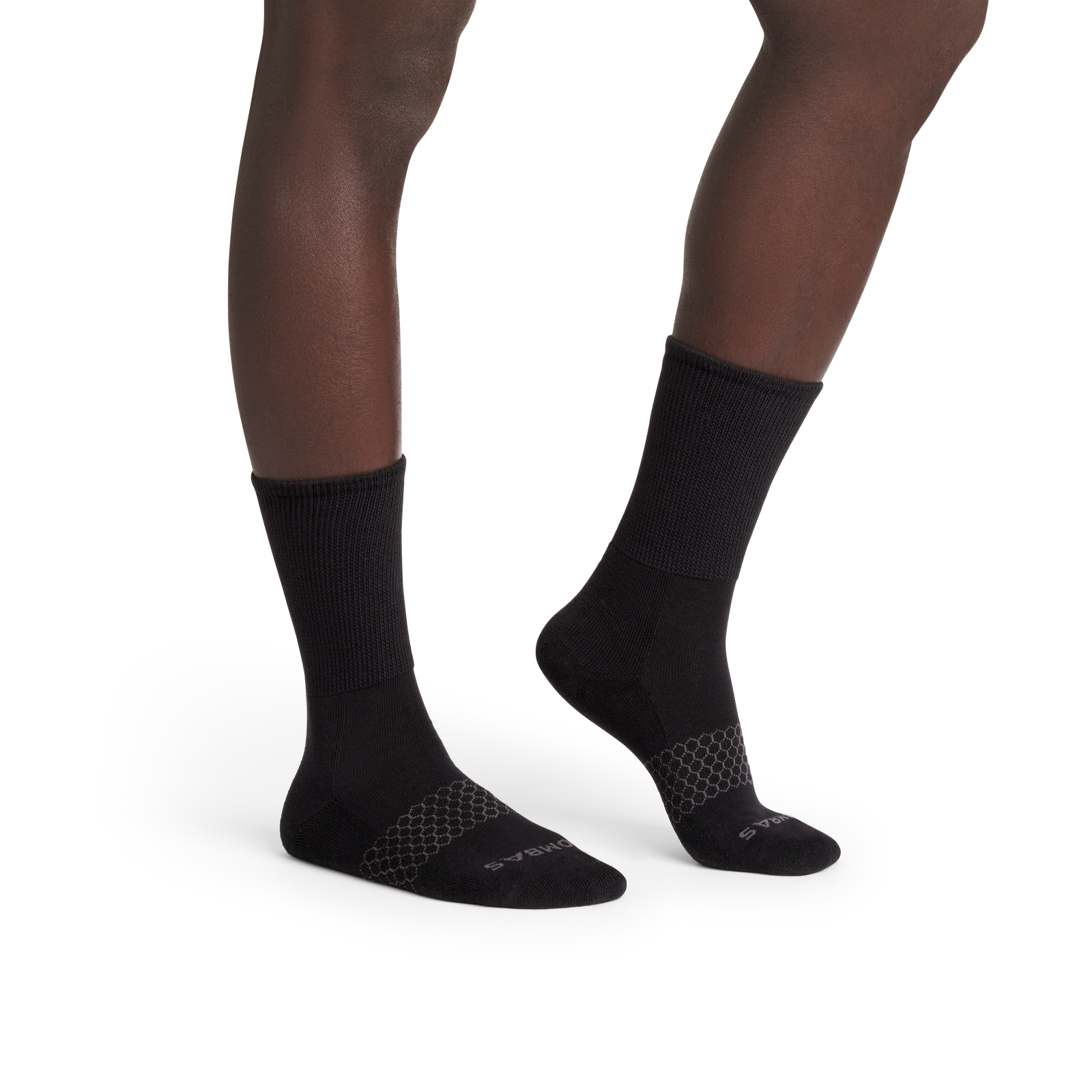 official-bombas::10114-black-adult-male-onmodel-2-transparent.png
