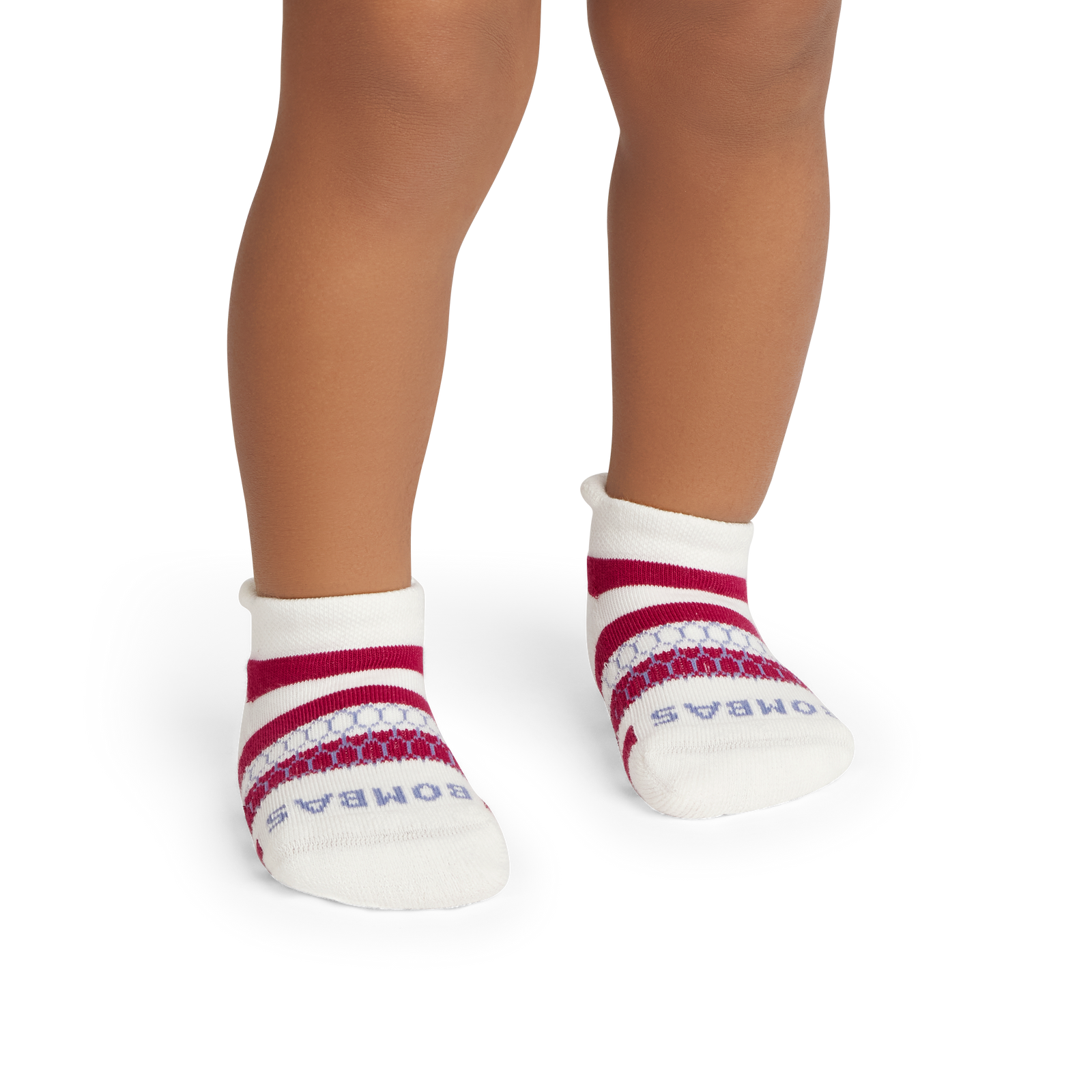 official-bombas::10139-softwhite-pomegranate-toddler-unisex-onmodel-2-transparent.png