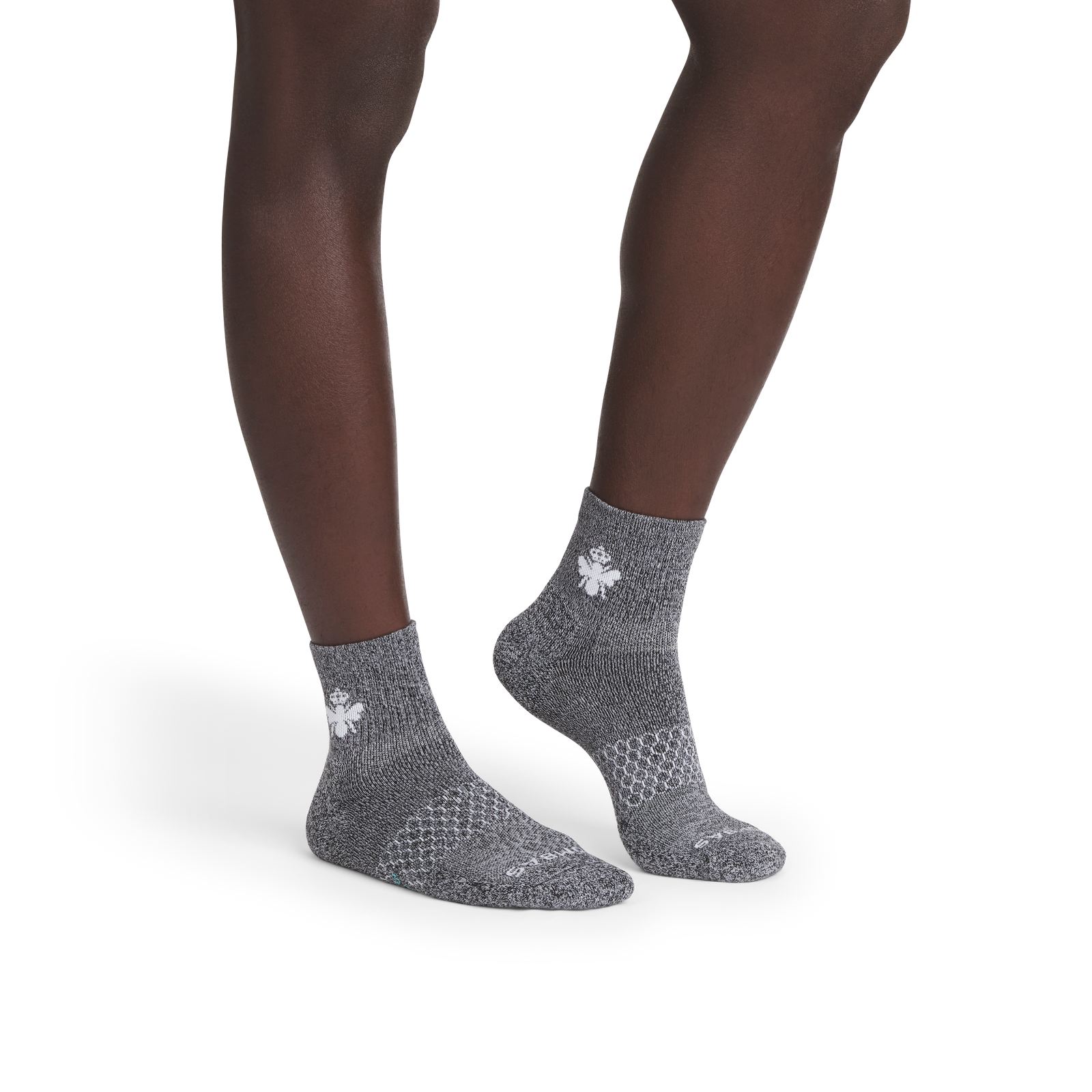 official-bombas::10340-black-white-adult-male-onmodel-2-transparent.png