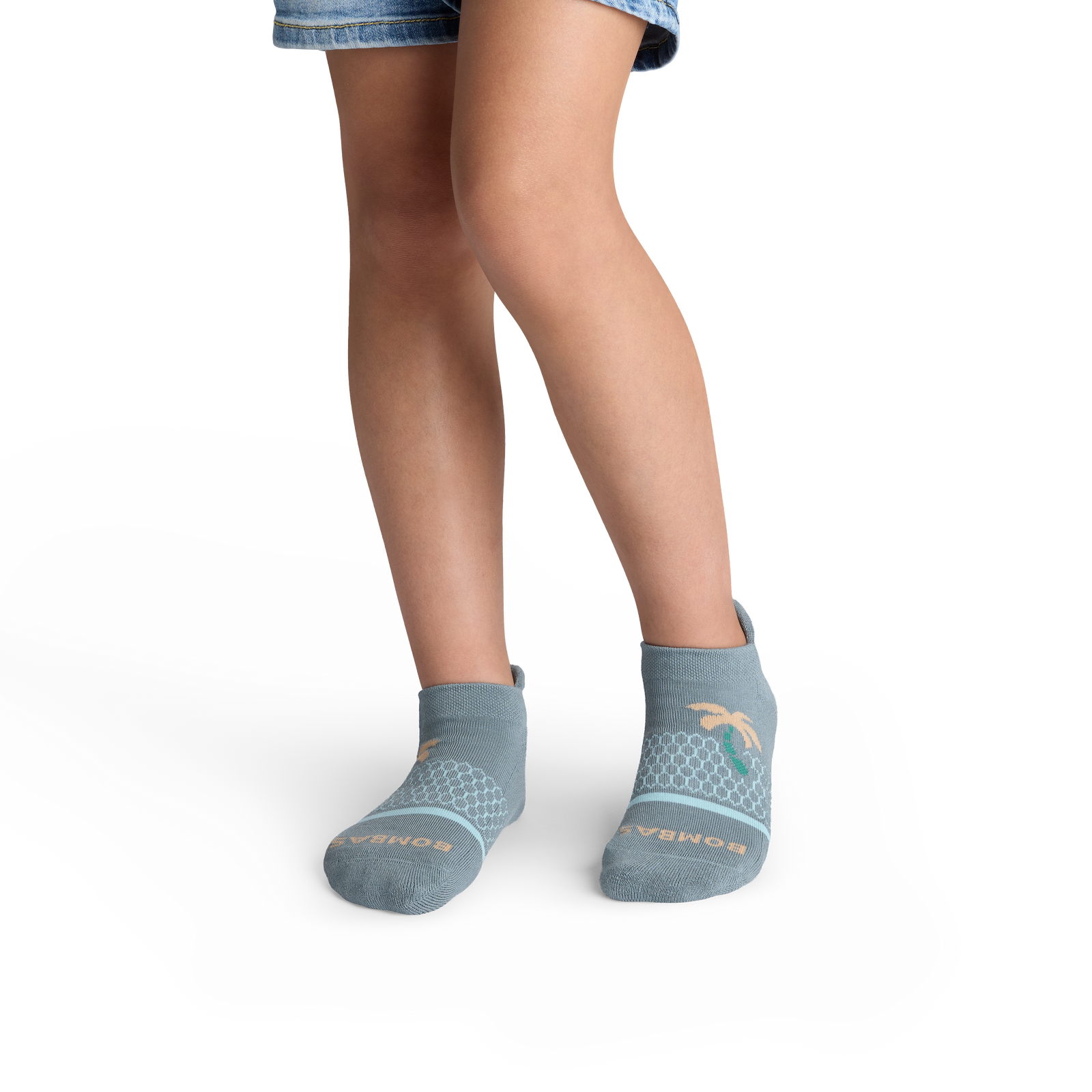 official-bombas::10476-seastorm-islandblue-youth-unisex-onmodel-2-transparent-_1_.png