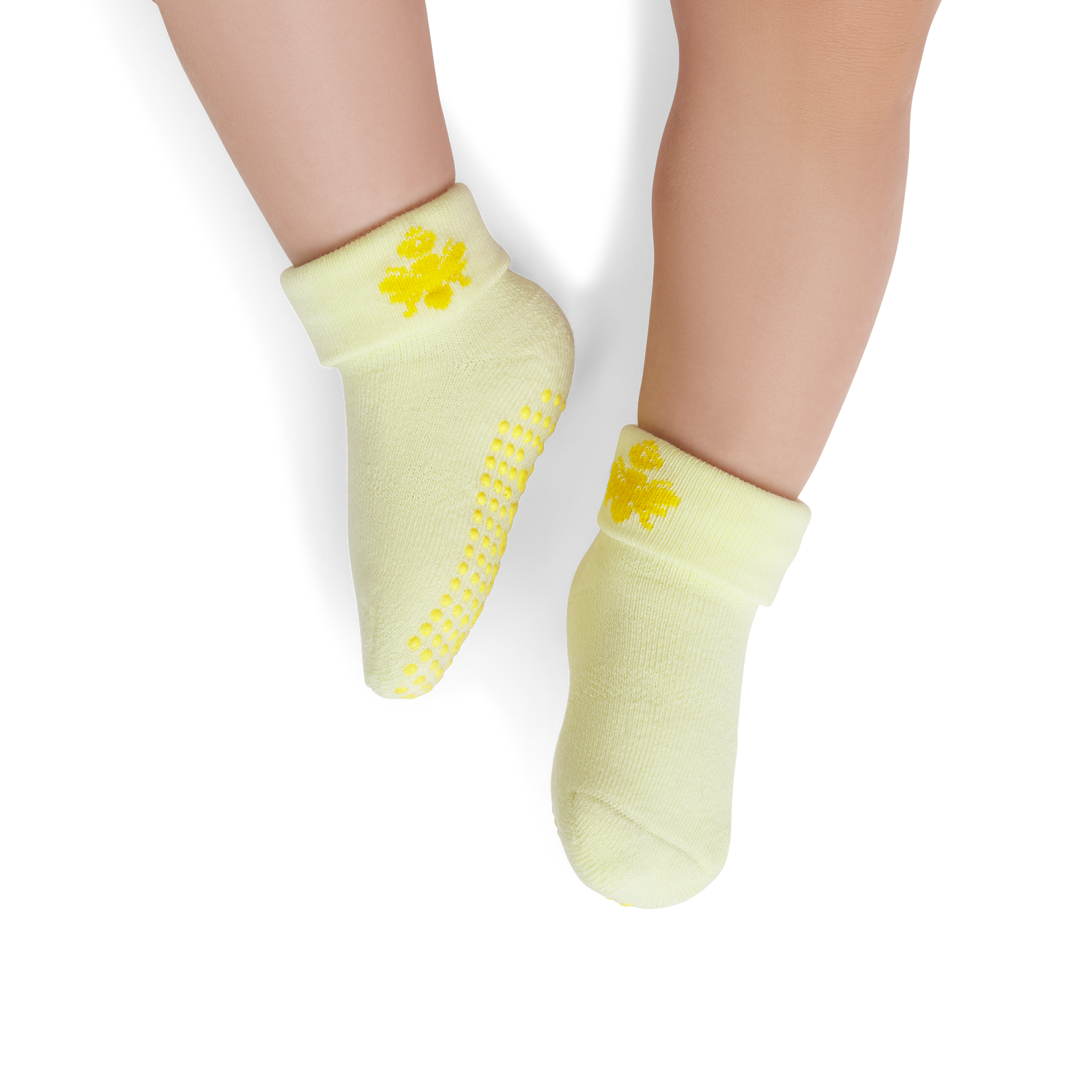 official-bombas::6575-lightmeringue-mustard-baby-6-12-unisex-onmodel-2-transparent.png