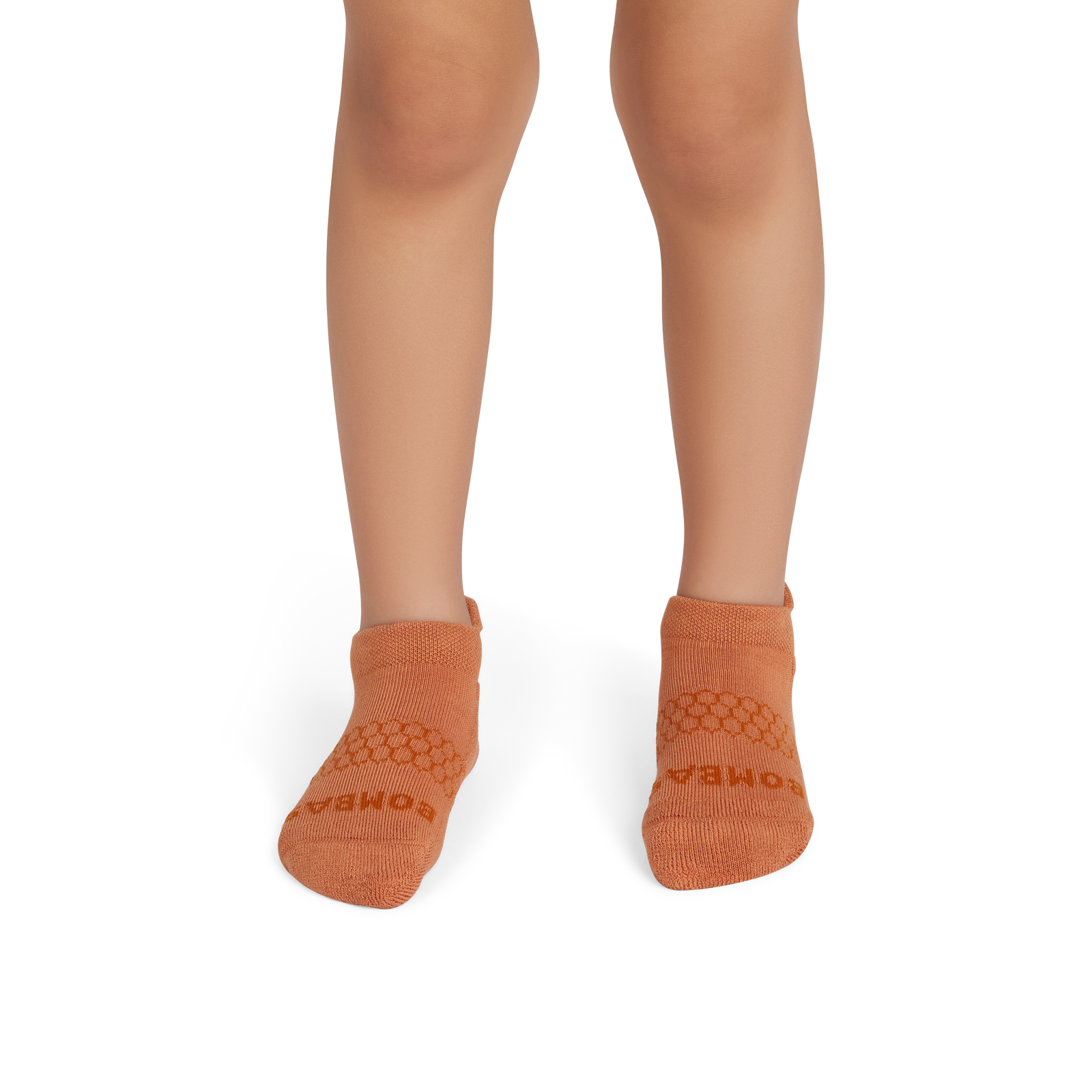 official-bombas::9146-adobe-richcopper-junior-unisex-onmodel-2-transparent.png