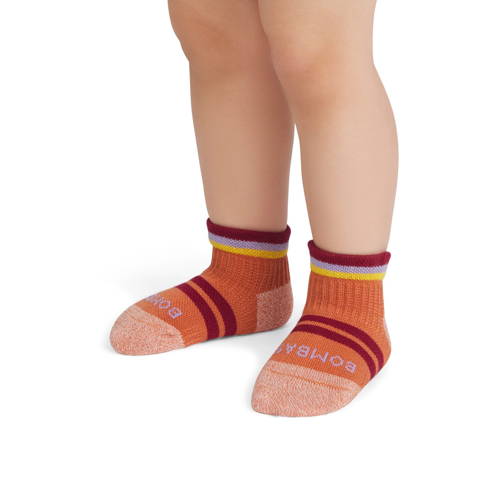 official-bombas::9196-adobe-toddler-unisex-onmodel-1-transparent.png